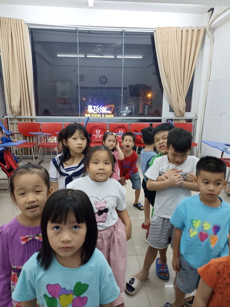 Young Vietnamese students at an evening language center class in Vietnam