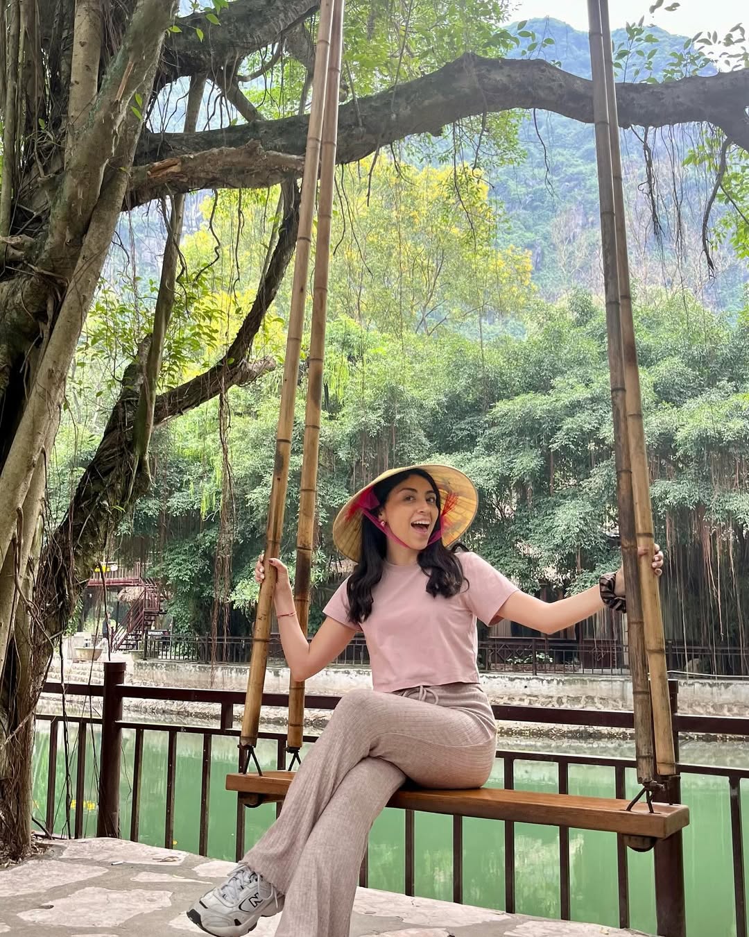 Bárbara laughing on a swing in Ninh Binh