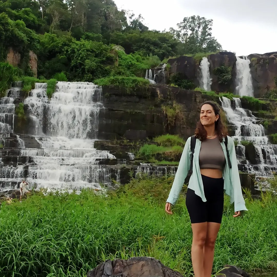 Camila at a waterfall in the Vietnamese highlands
