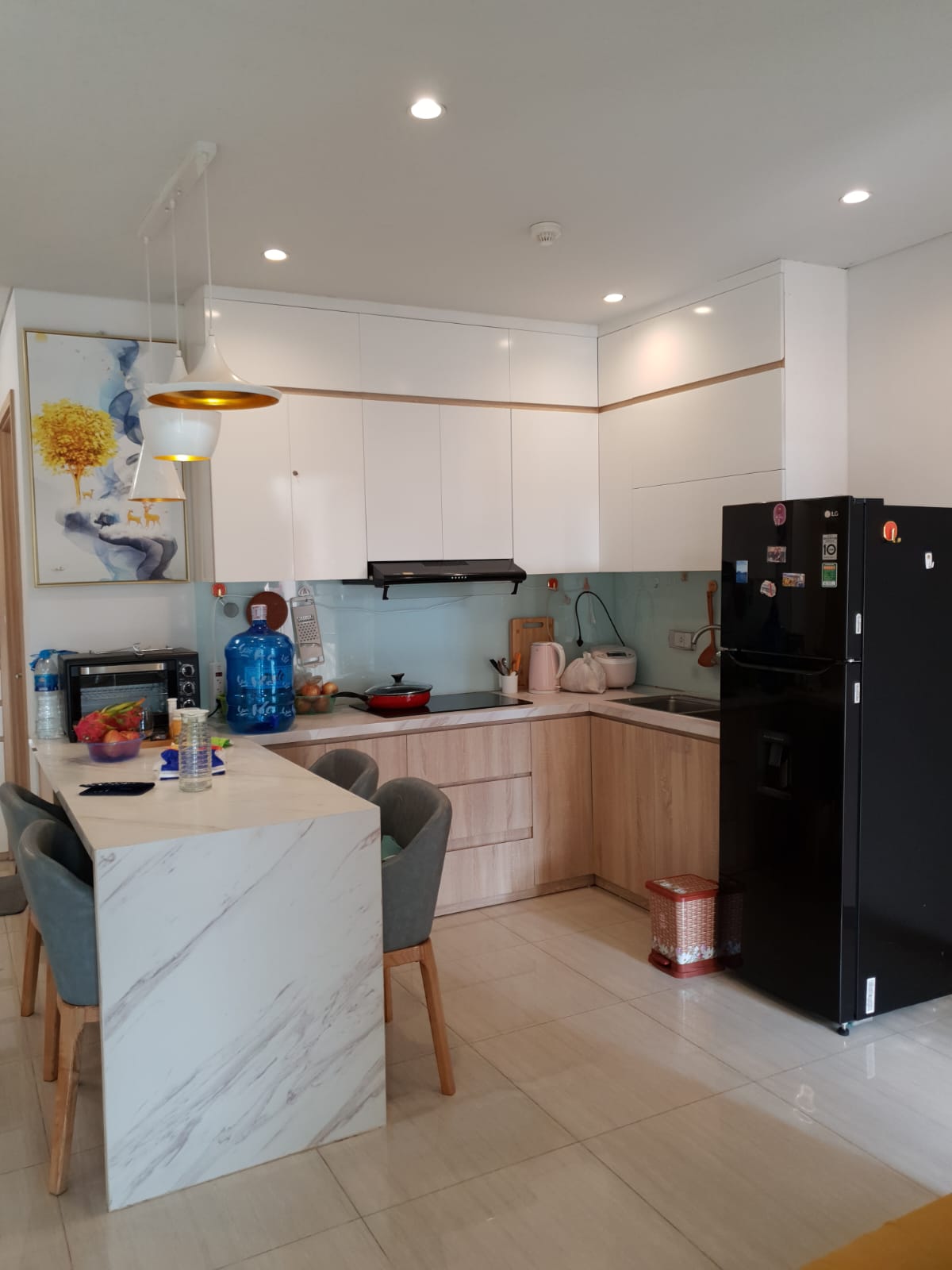 Modern fully-furnished teacher apartment kitchen Vietnam 2026