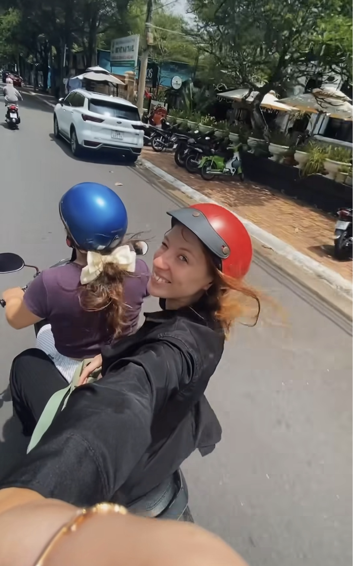 Ksenia on a motorbike in Ho Chi Minh City