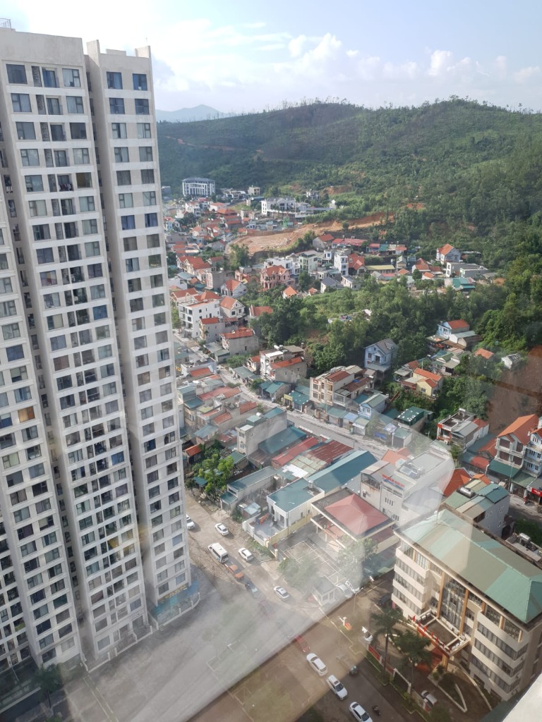 Ha Long Bay city skyline view from teacher apartment Vietnam