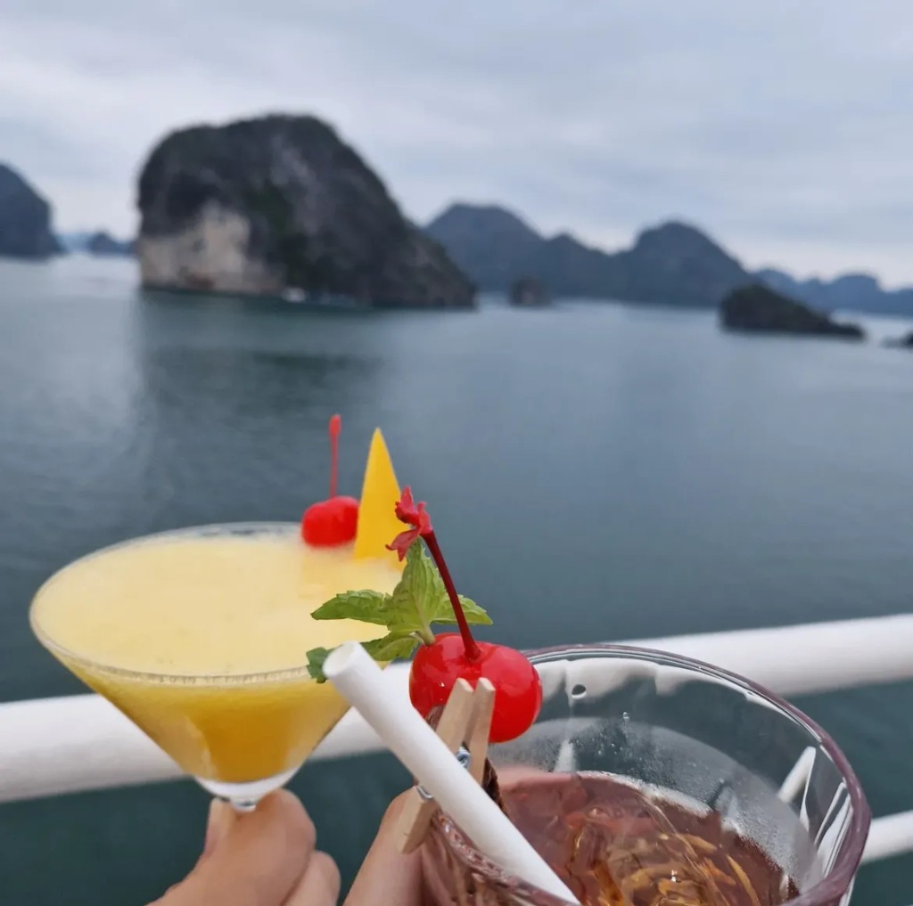 Limestone cliffs and turquoise water Ha Long Bay Vietnam