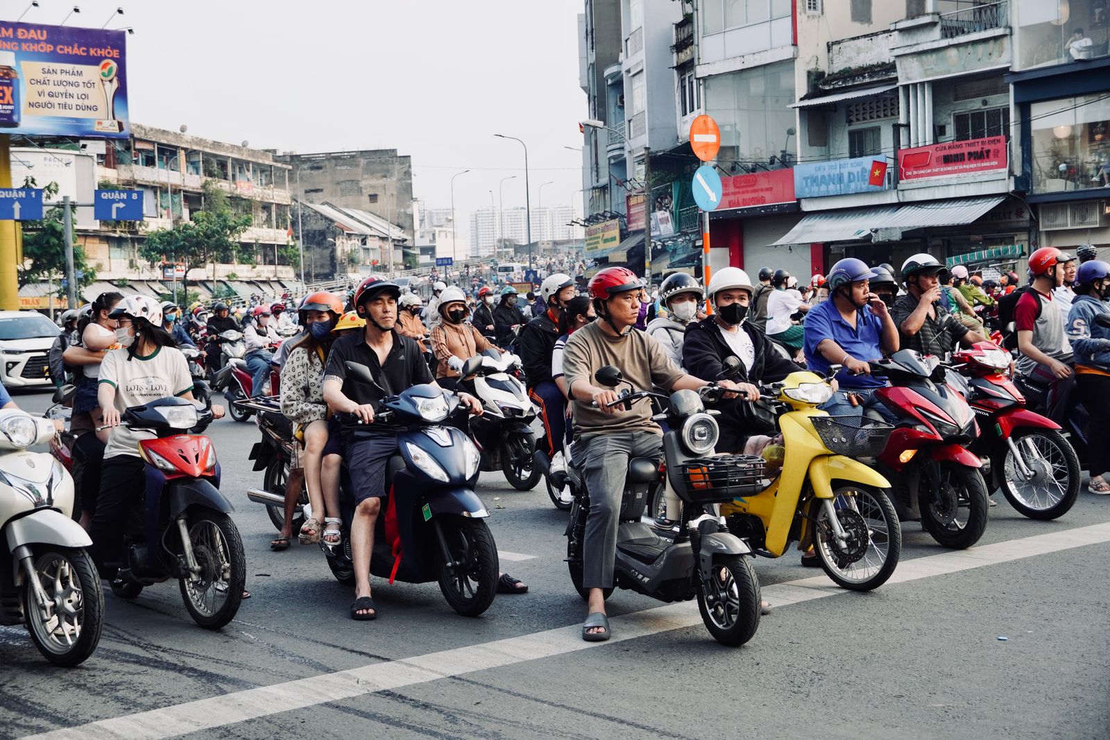 Busy motorbike traffic at an intersection in Ho Chi Minh City, Vietnam