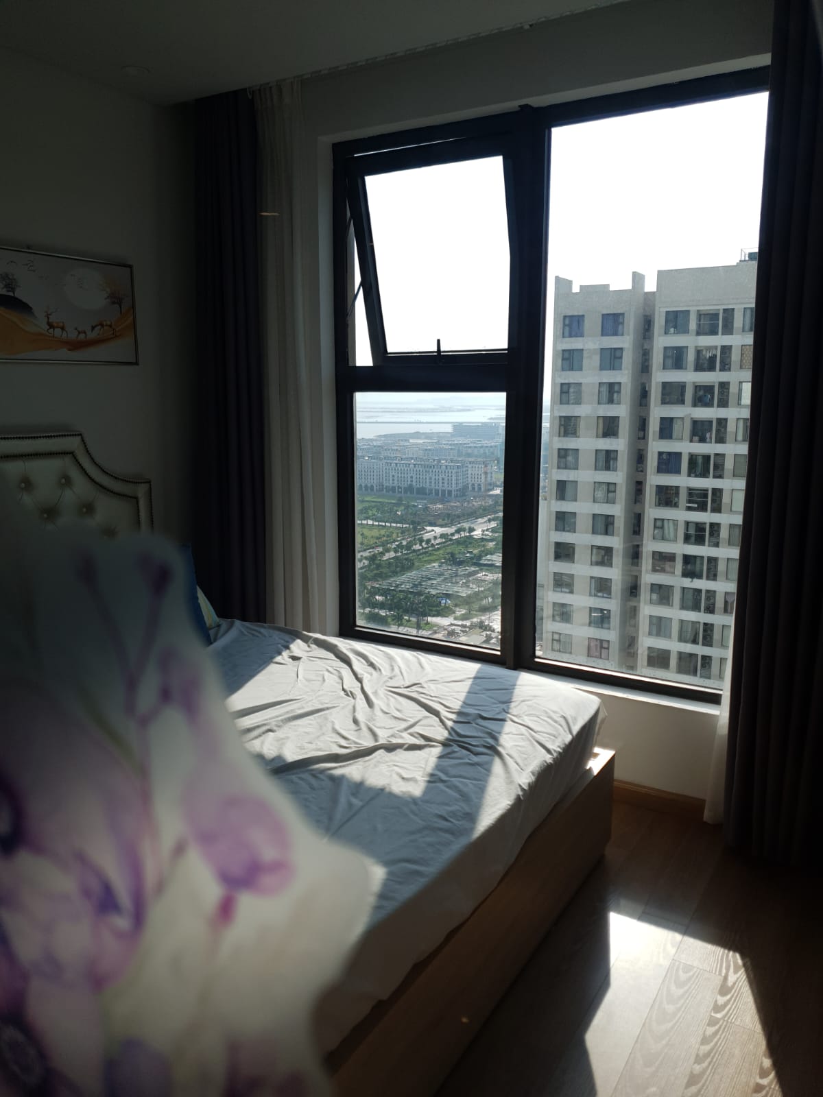 Teacher apartment bedroom with city view